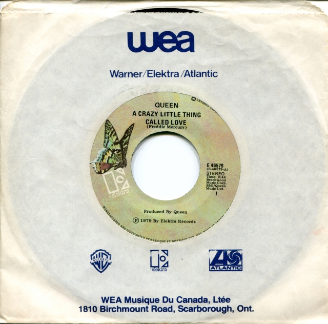 Crazy Little Thing Called Love / Spread Your Wings - ELEKTRA E 46579 CANADA (1979) ~ No PS. Green butterfly label